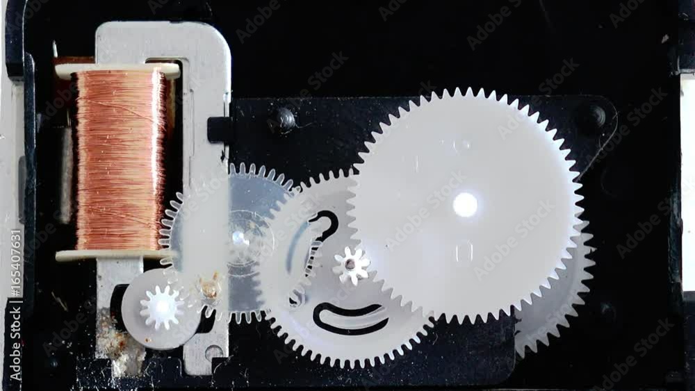 Cog Clock mechanism that uses electricity to drive Cog Clock mechanism that uses electricity to drive