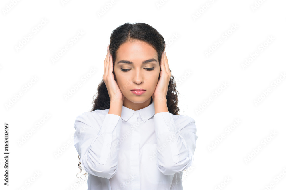attractive businesswoman in white shirt with closed eyes closing ears with hands, isolated on white attractive businesswoman in white shirt with closed eyes closing ears with hands, isolated on white