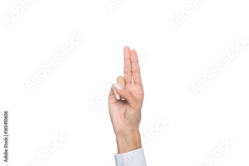 cropped view of person gesturing signed language or pointing up, isolated on white