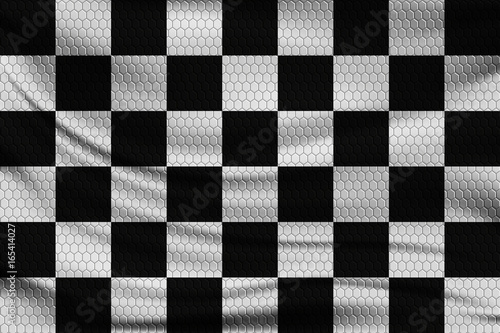 Checkered racing flag on a wavy fabric with a volumetric pattern of hexagons. Vector illustration