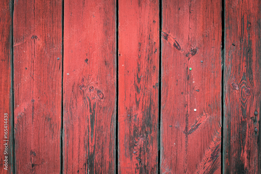 The old red wood texture with natural patterns The old red wood texture with natural patterns