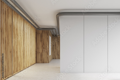 White wall in a wooden office hall