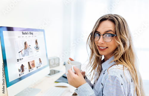 Young blogger woman smiling