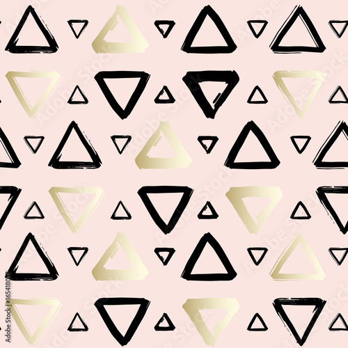 Seamless geometric ornament from handdrawn triangles. Can be used for fabrics and backgrounds