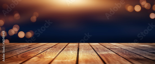 Christmas bokeh background with wooden table
