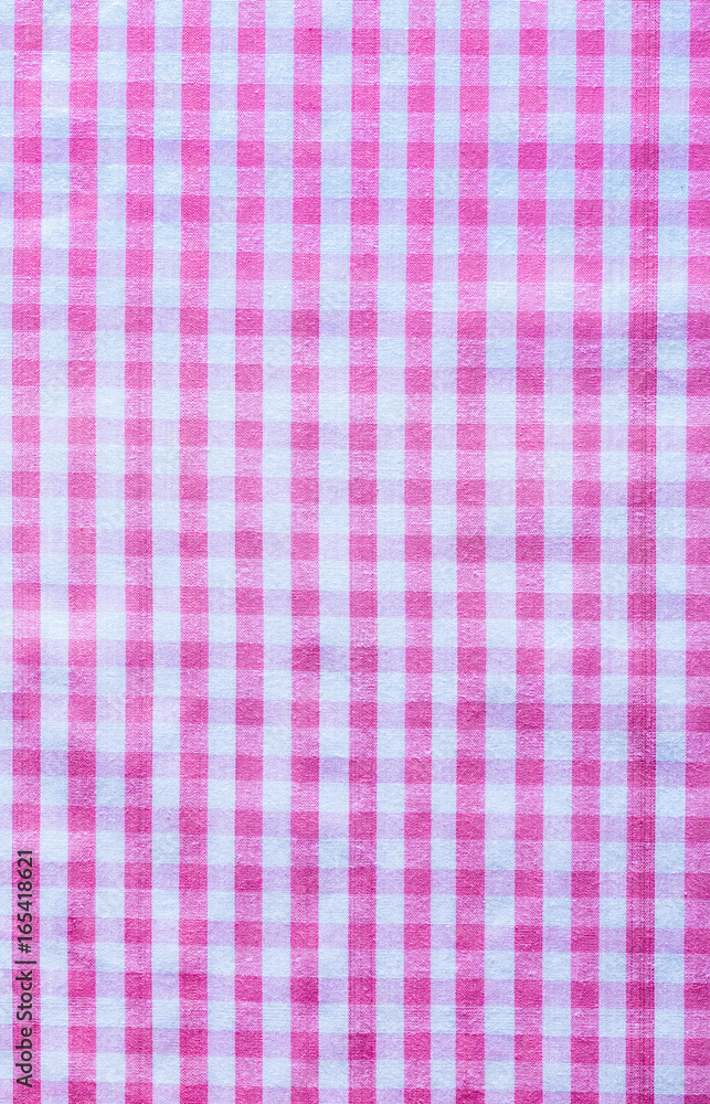Pink checked cotton background close up view Pink checked cotton background close up view