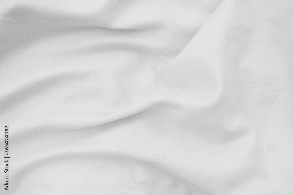 Fototapeta premium Smooth elegant white silk or satin luxury cloth texture can use as wedding background. Luxurious background design