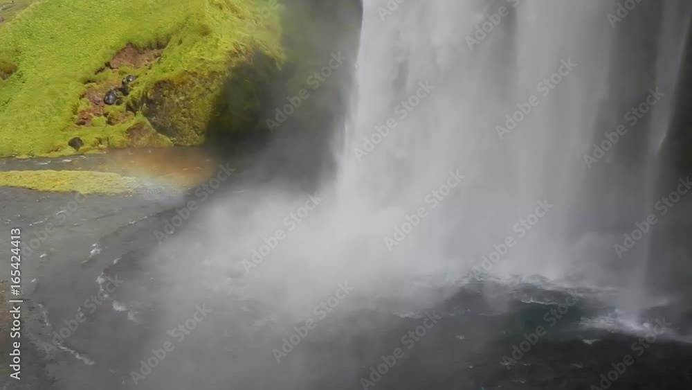 amazing Seljalandsfoss waterfall in southern iceland where you can walk behind
amazing Seljalandsfoss waterfall in southern iceland where you can walk behind