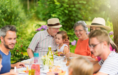 Lunch in the garden for multi-generation family