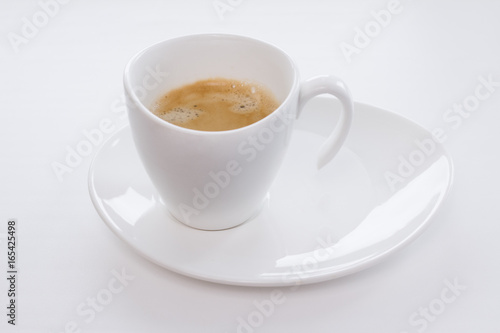 Coffee - white cup on white background - side view