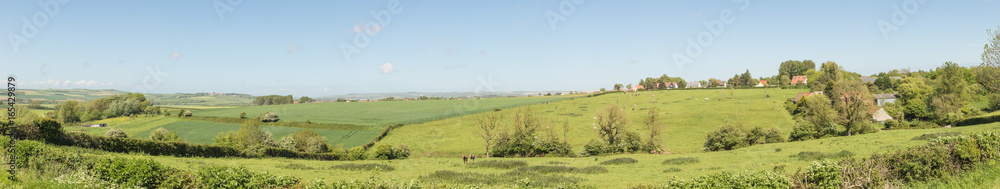 Typical countryside at the Opal Coast with rolling hills and hedges