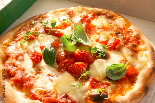 Fototapeta Naklejka Na Ścianę i Meble -  Italian Pizza Margherita in a Pizza Box