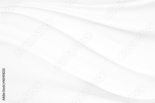 White cloth background abstract with soft waves. © buraratn