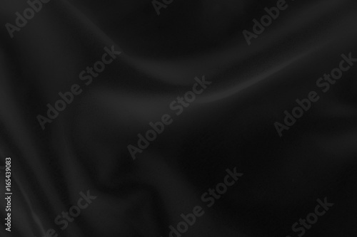 black cloth background abstract with soft waves.