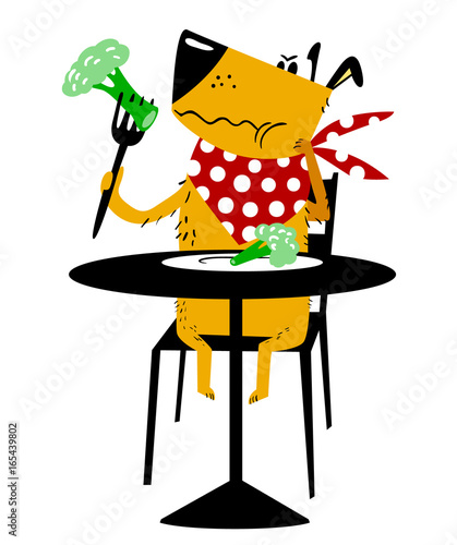 The dog on a diet. A sad dog sits at a table and eats a broccoli cabbage with fork.