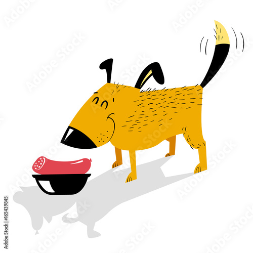 Natural food for dog. A cheerful dog is standing in front of a bowl of sausage.