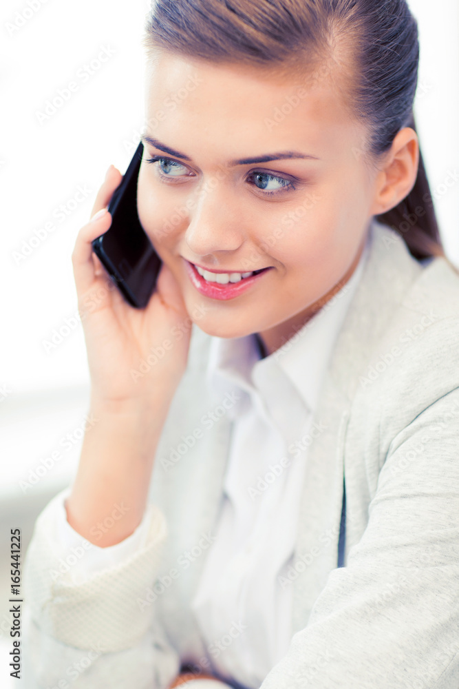 businesswoman with smartphone in office businesswoman with smartphone in office