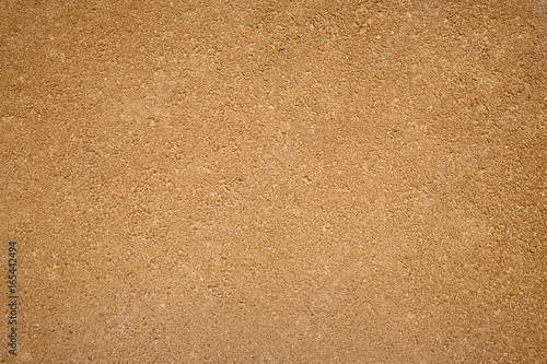 Brown background texture of rough asphalt, top view, copy space