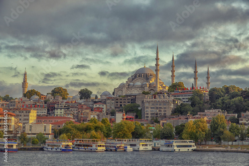 Suleymaniye mosque view from Halic at cloudy day, yellow effect applied © Solidasrock