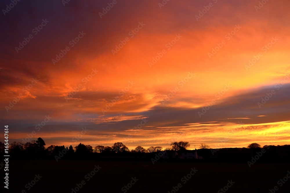 Orange clouds from an autumn sunset.