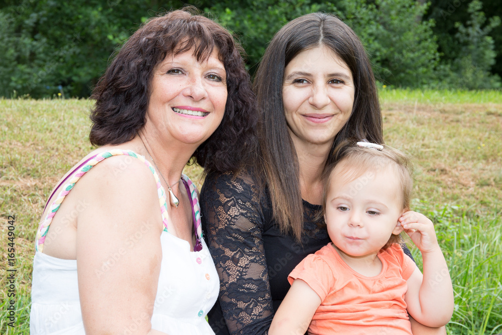 three generation of girl with grandmother,r daughter and little kid granddaughter three generation of girl with grandmother,r daughter and little kid granddaughter