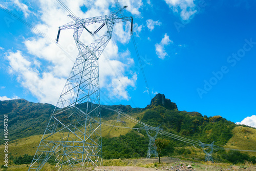 Beautiful landscape of Papallacta mountains in a sunny day with electrict towers in Quito Ecuador