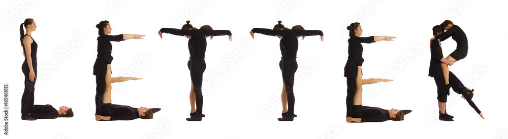 Black dressed people forming LETTER word Black dressed people forming LETTER word