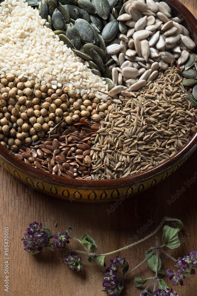 Spices and herbs in ceramic bowl. seasoning. Colorful natural additives. Spices and herbs in ceramic bowl. seasoning. Colorful natural additives.