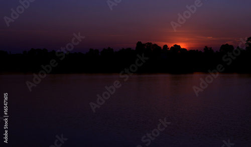 Sunset on river in the summer   Evening sky   Landscape   Backgrounds