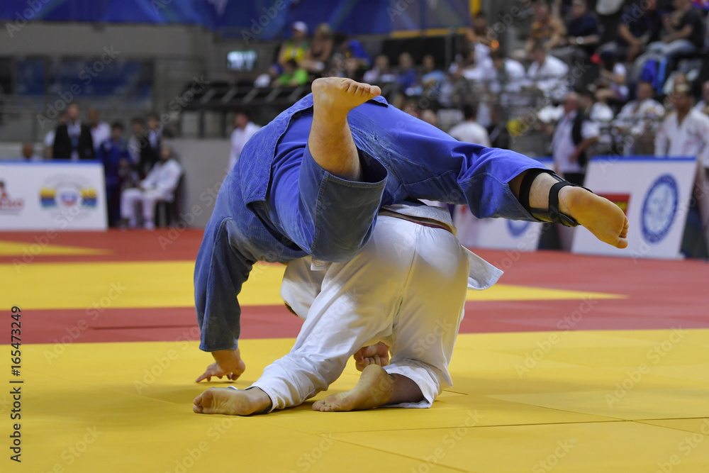 Male Judoka fighters during Judo competition Male Judoka fighters during Judo competition