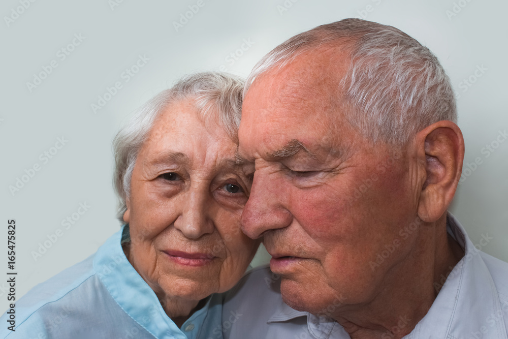 The elderly couple on studio background The elderly couple on studio background