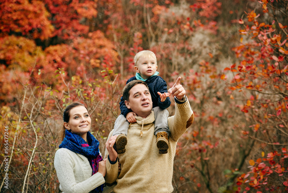 Family in autumn forest Family in autumn forest