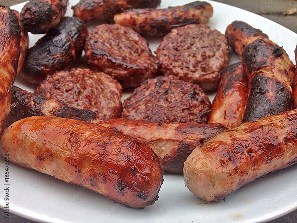 Grilling Season. BBQ Meat - beef and pork. Sausages and Burgers Grilling Season. BBQ Meat - beef and pork. Sausages and Burgers