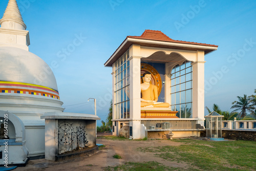 The Buddhist monastery Wella Devalaya and temple in Unawatuna with the big Buddha sculpture. Devol is one of the twelve deities worshiped in Sri Lanka as Dolos Deviyo