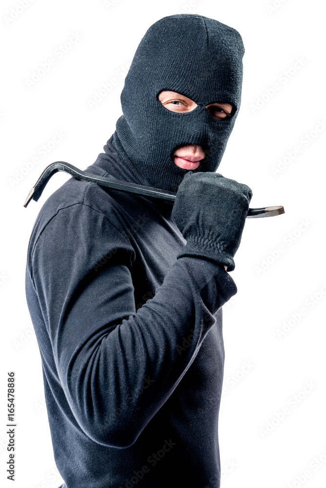 Robber with a crowbar in black clothes on a white background Robber with a crowbar in black clothes on a white background