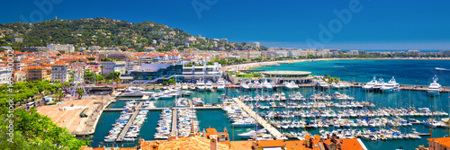Coastline view on french riviera with yachts in Cannes city center. photo
