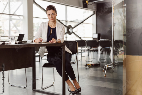 Beautiful businesswoman at the co-working