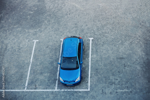 Blue car at the parking