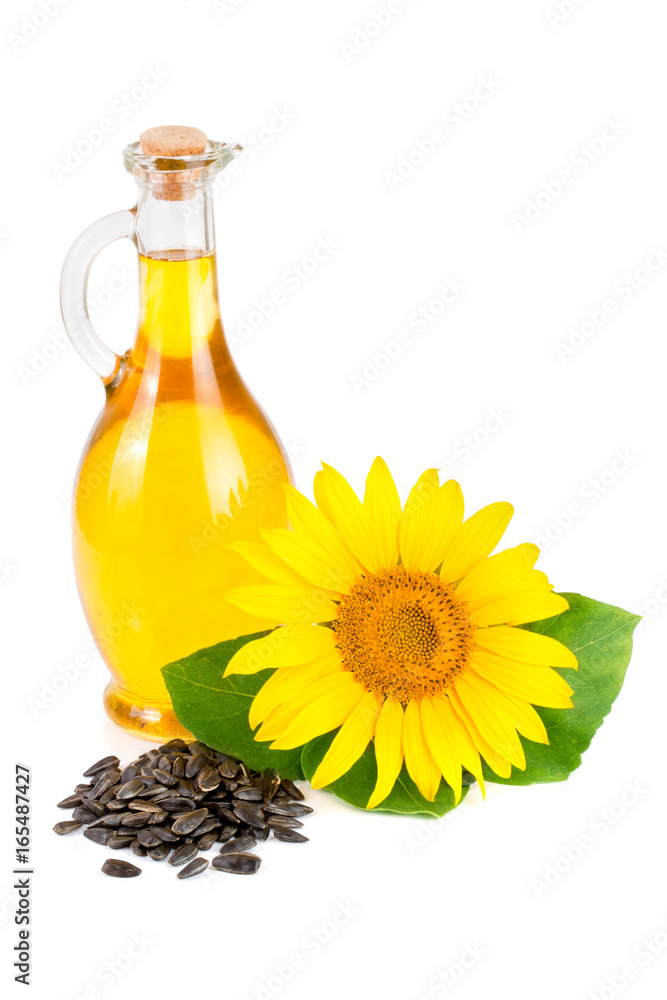 Sunflower oil, seeds and flower isolated on white background Sunflower oil, seeds and flower isolated on white background