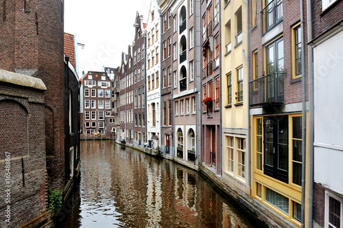 Amsterdam, Holland, Europe - scenic view of the canal and buildings © tanialerro