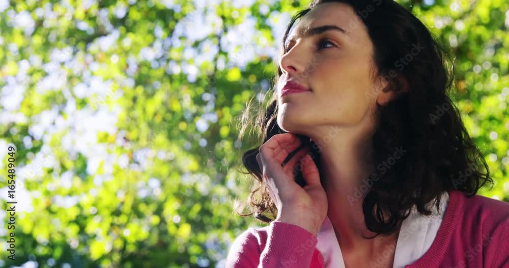 Beautiful woman relaxing in garden Beautiful woman relaxing in garden