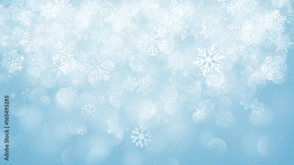 Christmas background of snowflakes with bokeh effect in light blue Christmas background of snowflakes with bokeh effect in light blue