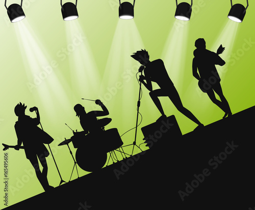 Hard Rock band silhouette on stage. Action angle with searchlights.