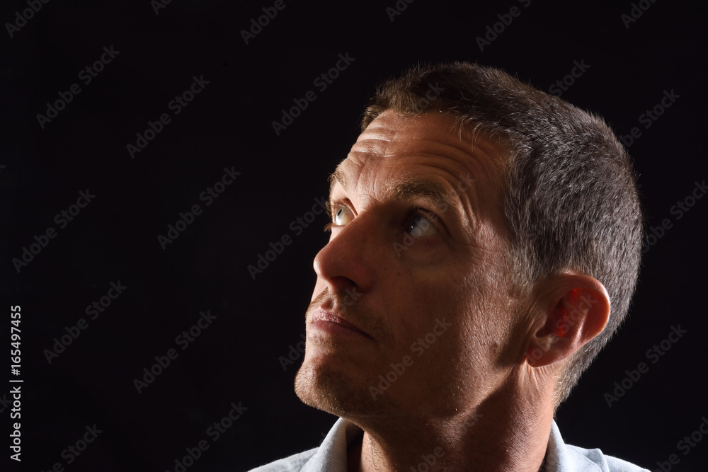 Fototapeta premium portrai of a man with black background