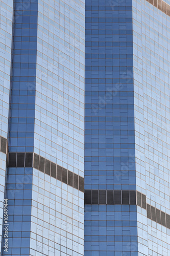 Wall of tall building or glass of skyscraper background.