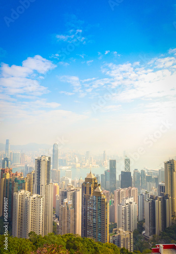 Beautiful view from Victoria Peak to the city of Hong Kong in the horizont in a sunny day with blue sky
