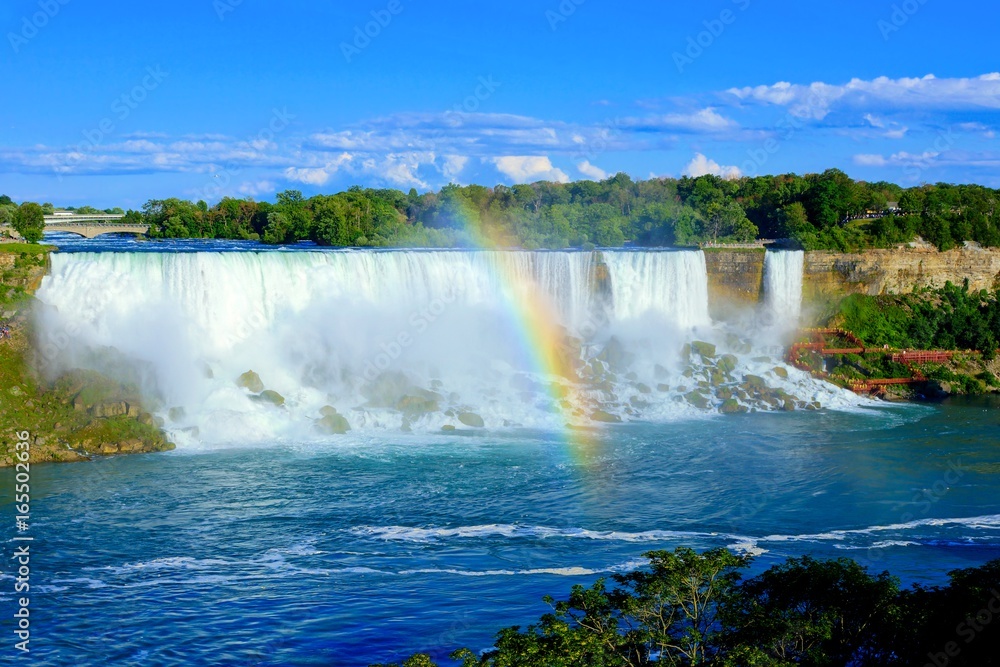 View of the American side of Niagara Falls with beautiful rainbow View of the American side of Niagara Falls with beautiful rainbow
