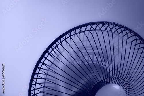 A studio photo of a stand electric fan