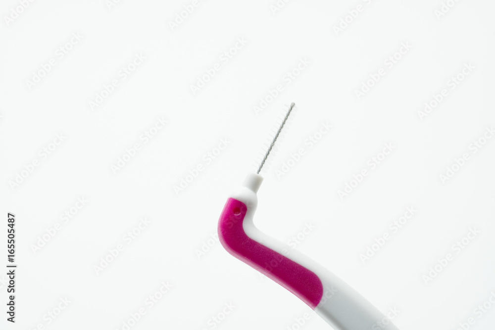 Interdental brush isolated on white background Interdental brush isolated on white background