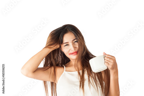 Happy asian girl with white cup of coffee or tea in morning and smashed lipstick on her face